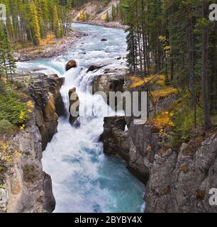 A falls in a narrow and deep canyon Stock Photo