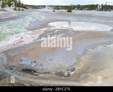 NORRIS JUNCTION, WYOMING - JUNE 7, 2017: Whirligig Geyser in the Porcelain Basin Area of Norris Geyser Basin in Yellowstone National Park Stock Photo