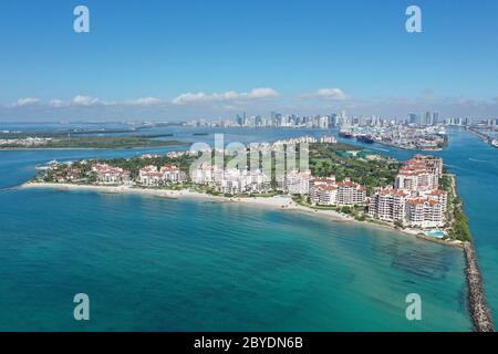 Aerial view of Fisher Island and Government Cut, Florida during COVID-19 stay-at-home order on clear sunny morning. Stock Photo