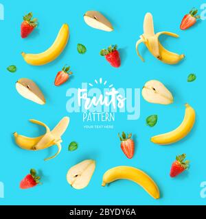 Pattern with banana, strawberry and pear. Tropical abstract background. Banana, strawberry and pear on the blue background. Stock Photo