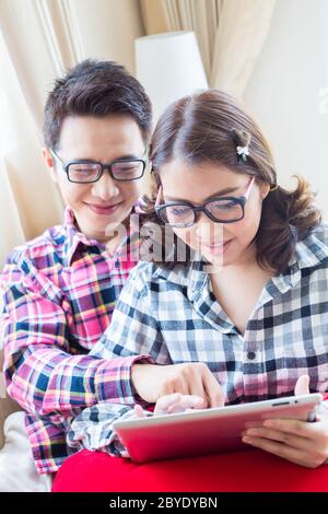 couple using tablet Stock Photo