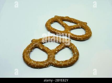 Salted pretzels on a white isolated background Stock Photo