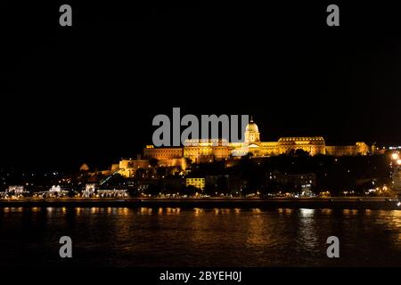 View landscape and cityscape of Old town city and Hungarian Parliament with Danube Delta river and Buda Chain Bridge in night time in Budapest, Hungar
