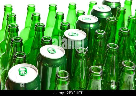 Empty glass beer bottles and cans Stock Photo