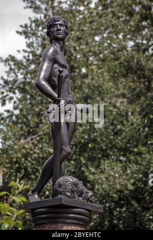 Monument statue for the UK's Machine Gun Corps of World War One. The boy David holding a large sword stands over the head of Goliath. Chelsea Embankme Stock Photo