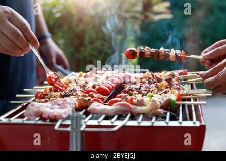 Close up barbecue grill with various kinds of meat. Stock Photo