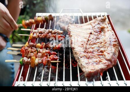 Close up barbecue grill with various kinds of meat. Stock Photo