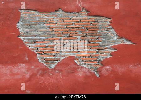 Cracking grunge weathered vintage and fragment of Red brick wall using as background Stock Photo