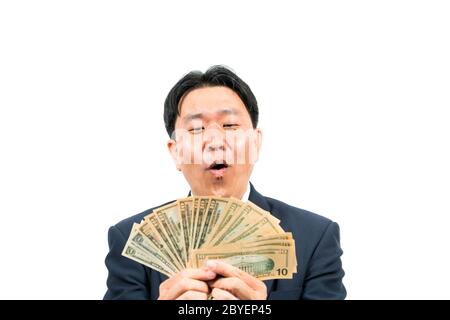 Businessman holding money Stock Photo
