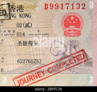 passport with hong kong visa and stamps Stock Photo