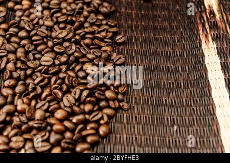Coffee Beans over Wood Background Stock Photo