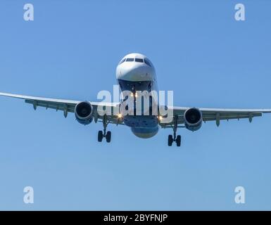 low angle shot of a flying aeroplane Stock Photo