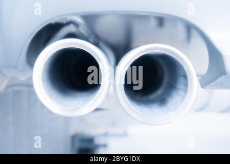 You looking into a exhaust pipe with inverted colors. It's a closeup. Stock Photo