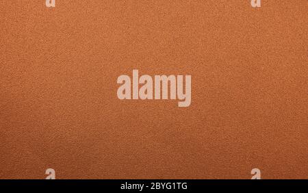 A metal plate texture in a copper color. Stock Photo