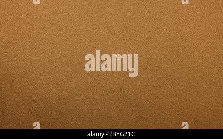A metal plate texture in a gold bronze color. Stock Photo
