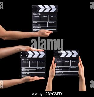 Set of film clapper boards and human hands isolated on black background Stock Photo