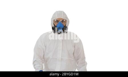 Man wearing hazmat suit walking on white background. Stock Photo