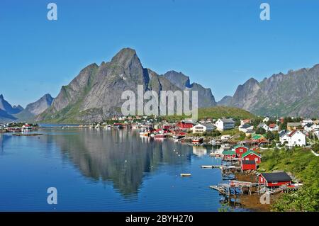 The fishing village of Reine, located on the island of Moskenesøya in the Lofoten archipelago, above the Arctic Circle, Norway Stock Photo