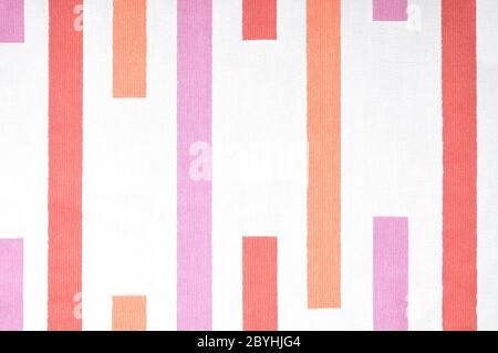 Closeup detail of pink, red, orange and beige striped fabric Stock Photo
