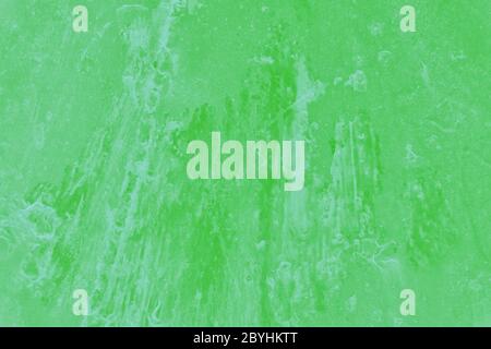 Light green rusty texture wall background. Vintage, toned Stock Photo