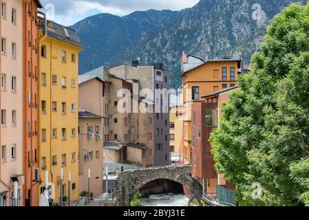 ESCALDES-ENGORDANY, ANDORRA - 2020 juny 8: River Valira on Engordany Bridge and houses view in a snowfall day in small town Escaldes-Engordany in Ando Stock Photo