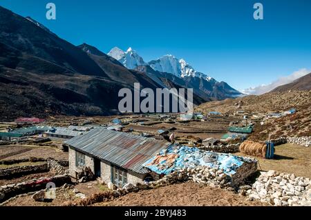 Nepal. Island Peak Trek. Looking towards the peaks of Ama Dablam  from above Dingboche Village Stock Photo