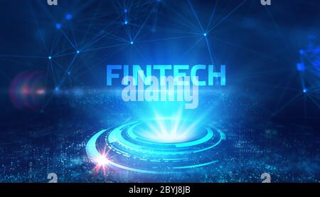 Fintech -financial technology concept.Young businessman  select the icon Fintech on the virtual display. Stock Photo