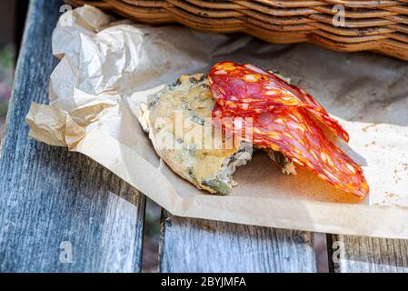 Olive bread and spicy sopressata, excellent picnic. Stock Photo