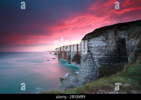 dramatic sunrise over cliffs in Atlantic ocean, Etretat, France Stock ...