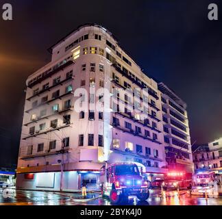 Firefighters at a burning building in Panama City Stock Photo