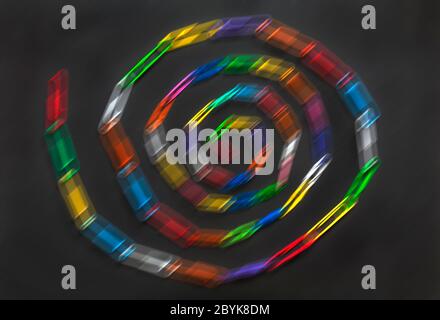 Paperclip chain spiral, Paperclips chain spiral, isolated on black background - paper clips, paper clip abstract blur blurred Stock Photo