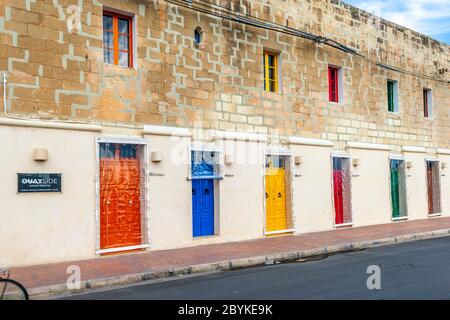 Colorful doors and window frames in Marsaxlokk, Malta Stock Photo