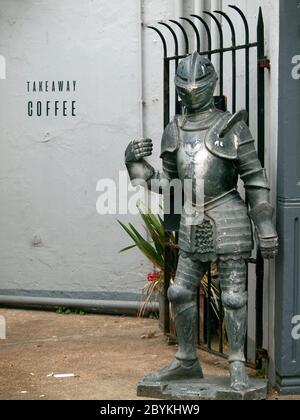 A suit of armour outside a coffee shop in The Lanes, Brighton Stock Photo