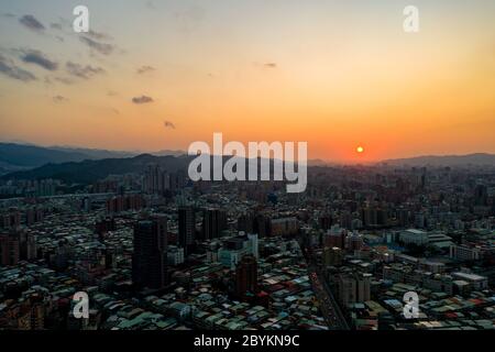 Taipei City Aerial View - Asia business concept image, panoramic modern cityscape building bird’s eye view under sunrise and morning blue bright sky, Stock Photo