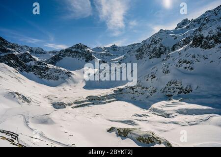 Winter fir trees in mountains covered with fresh snow. Austrian alps in Kuehtai ski resort in winter. Travel and holiday concept Stock Photo
