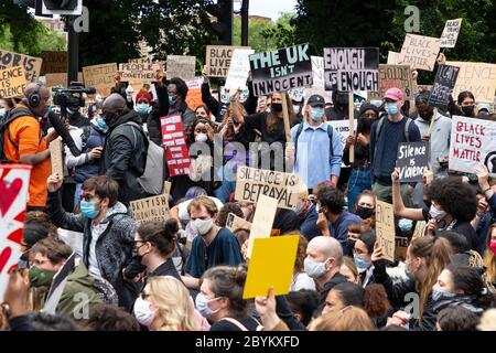 Crowd of protesters gathered outside the US embassy during a Black Lives Matters protest, Nine Elms, London, 7 June 2020 Stock Photo