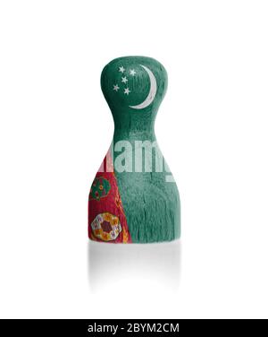 Wooden pawn with a flag painting Stock Photo