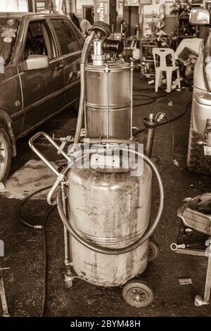 equipment tools repair machine parts in garage Stock Photo