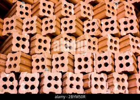 brick kiln. collection set of red bricks stack in oven factory before logistic transportation Stock Photo