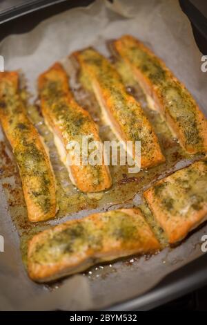 Baked fish fillets in an oven pan Stock Photo