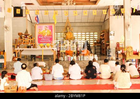 buddhist prayers with monks in monasteries, buddha temple in thailand Stock Photo