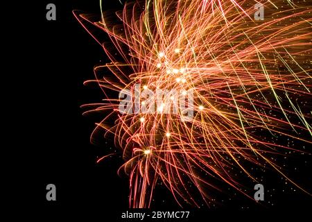 Exploding Fireworks in the night sky, The Stray, Harrogate, North Yorkshire, England, UK. Stock Photo