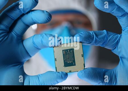 Serious man showing metal detail Stock Photo