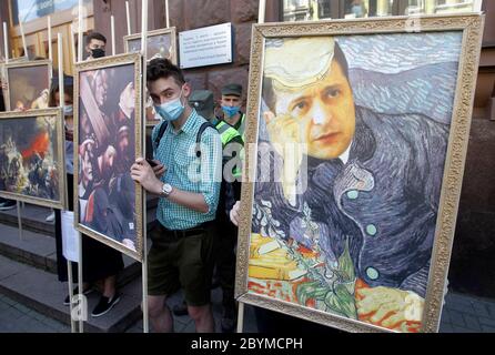 A painting depicting Ukrainian President, Volodymyr Zelensky during the event.Supporters of Former Ukrainian president and the European Solidarity political party leader, Petro Poroshenko set up a symbolic exhibition with portraits of Ukrainian President, Volodymyr Zelensky and top Ukrainian officials and businessmen copulated with paintings of well-known world artists, in a rally showing support to Poroshenko as he arrives for questioning as a witness in criminal cases, outside the State Bureau of Investigation in Kiev. Stock Photo