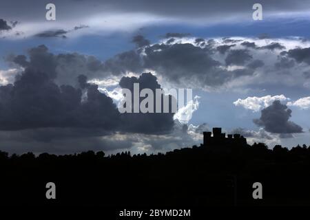 24.07.2016, Torre Alfina, Viterbo, Italy - Thunderclouds over the Castello Torre Alfina. 00S160724D001CAROEX.JPG [MODEL RELEASE: NOT APPLICABLE, PROPE Stock Photo