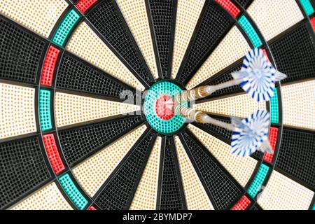 Two Arrows In The Centre Of A Dart Board. Concept success, business, sport Stock Photo