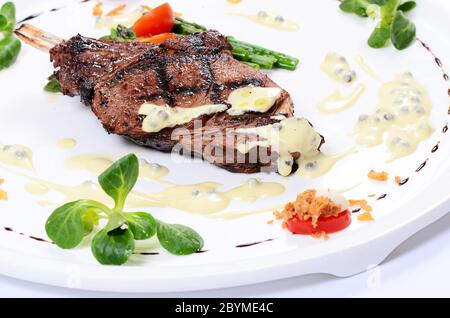 rack of lamb on grill with an asparagus Stock Photo