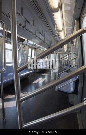 EMpty subway train car during the Coronavirus Covid-19 pandemic in Brooklyn, New York City. Stock Photo