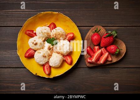 Cottage cheese dumplings with strawberry. Boiled, breakfast. Stock Photo