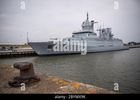 Wilhelmshaven, Germany. 10th June, 2020. The frigate 'North Rhine-Westphalia' is moored in the naval port. The Navy has put the second of four new F 125 class frigates into service. The 'North Rhine-Westphalia' is the sister ship of the 'Baden-Wuerttemberg', which joined the fleet a year ago. The ship was built for long-term maritime stabilization operations. Credit: Sina Schuldt/dpa/Alamy Live News Stock Photo